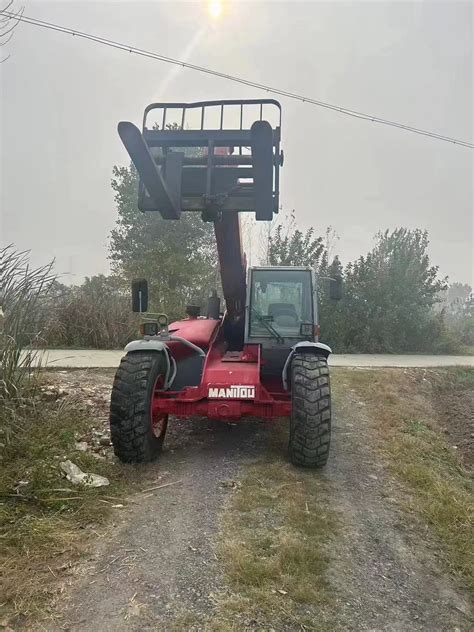 Image result for Manitou Cabless Telehandler Loader