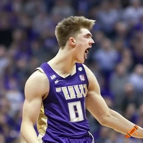 Caucasian basketball player slam dunking for the Washington Huskies in ...