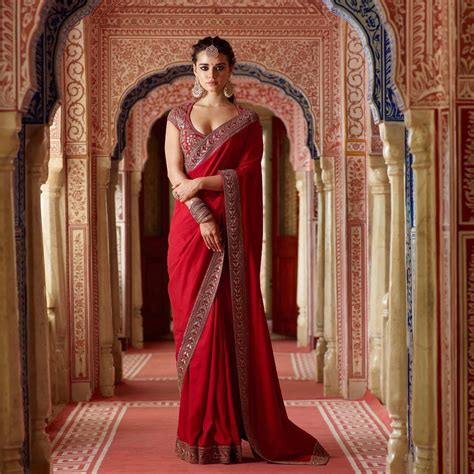 Look Hot in a Red Saree With Golden Border This Wedding Season