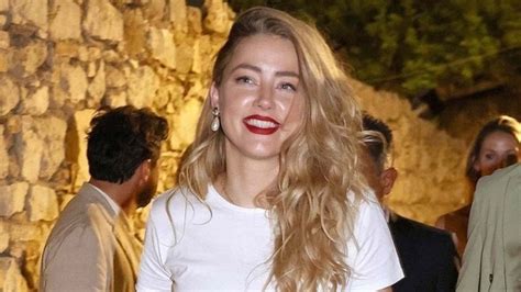 Amber Heard spotted with crutches in Madrid ahead of her training ...