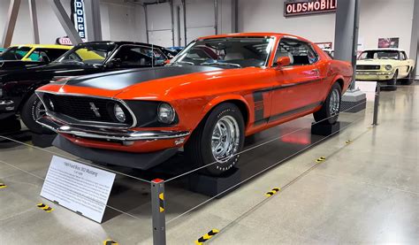 Rare 1969 Boss 302 Mustang: A Collector's Dream in Stunning Calypso Coral - DAX Street