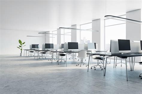 Modern workspace with high ceilings floating lights and urban skyline ...