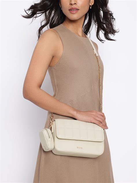 Amelia Large Off-White Sling by IRTH | House Of Titan | Shop Online