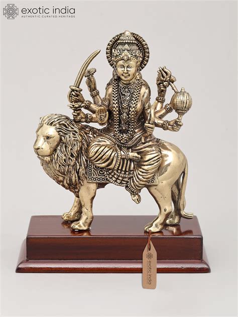 7" Ashtabhuja Durga on Lion Brass Idol with Wood Base – Exotic India Art