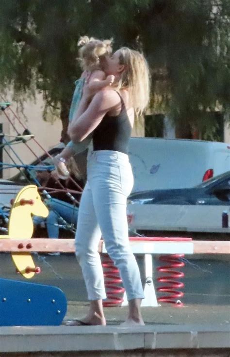 Amber Heard plays with daughter Oonagh on Spain vacay after losing ...