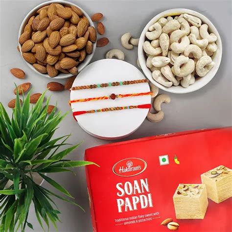 Send Traditional 3 Rakhi Set with Sweet and Dry Fruits combo - For ...