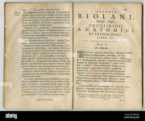 Worn old book pages of a Latin textbook. An old book with its pages on ...