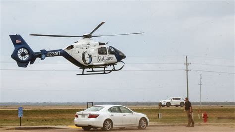 AirCare Medical Helicopter Carrying Pilot & Two Hospital Workers ...