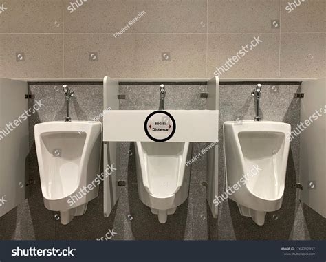 Social Distance Between Urinals Male Toilets Stock Photo 1762757357 | Shutterstock