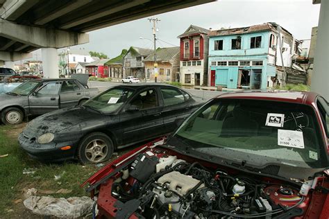 Two Cars Swept Away During Hurricane Katrina, a Truck Bed and a Sofa ...