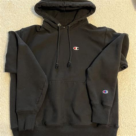 black champion hoodie - Depop