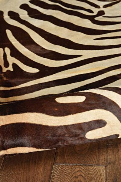 Zebra Cowhide 5' x 8' Area Rug - Brown | Value City Furniture