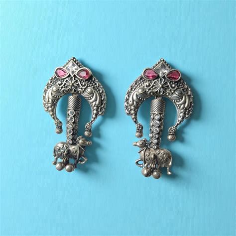 Amaya Silver Oxidised Tribal Tusk Earrings – TelaNaari