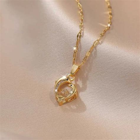 Golden Twin Dolphin Dancing Diamond Pendant Necklace – Masakali.com