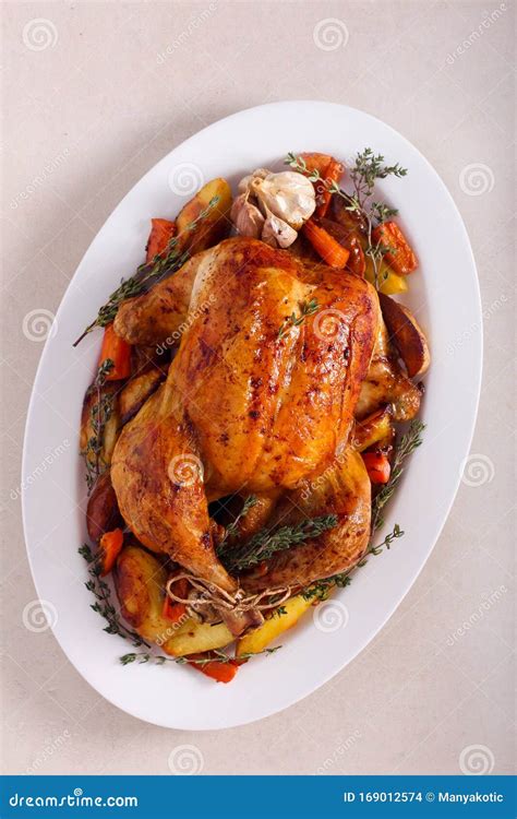 Roast Whole Chicken with Roast Vegetables Stock Photo - Image of ...