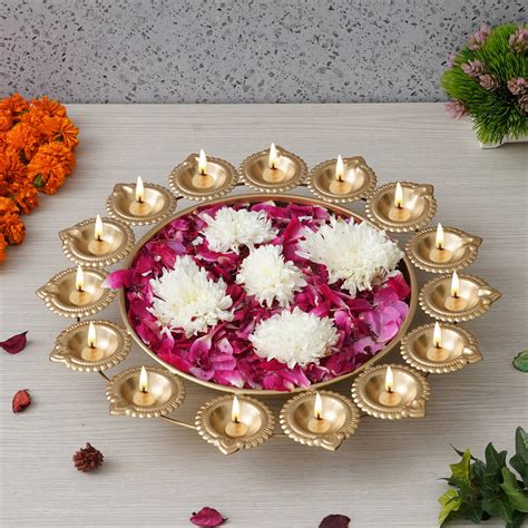 eCraftIndia Golden Metal Handcrafted Designer Urli with 15 Diyas