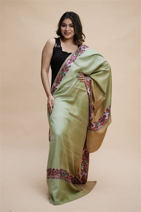 Ombre color kashmiri shawl with aari border gives a trendy look