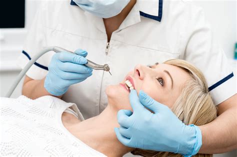 牙科医院图片-看牙科的美女和牙科医生素材-高清图片-摄影照片-寻图免费打包下载