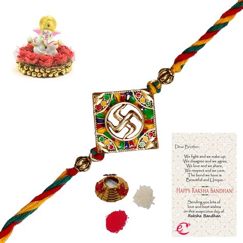 Designer Religious Swastik Rakhi with Lord Ganesha Idol on Decorative ...
