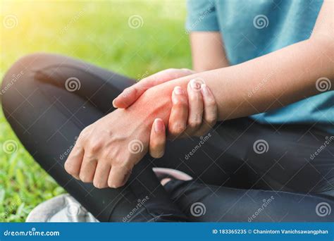 Young Woman Asian Have Accident and Holding Her Wrist Pain Twist Sprain ...