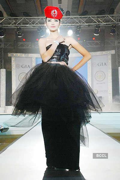 A model walks the ramp during Glam fashion show at Grand Hyatt in ...