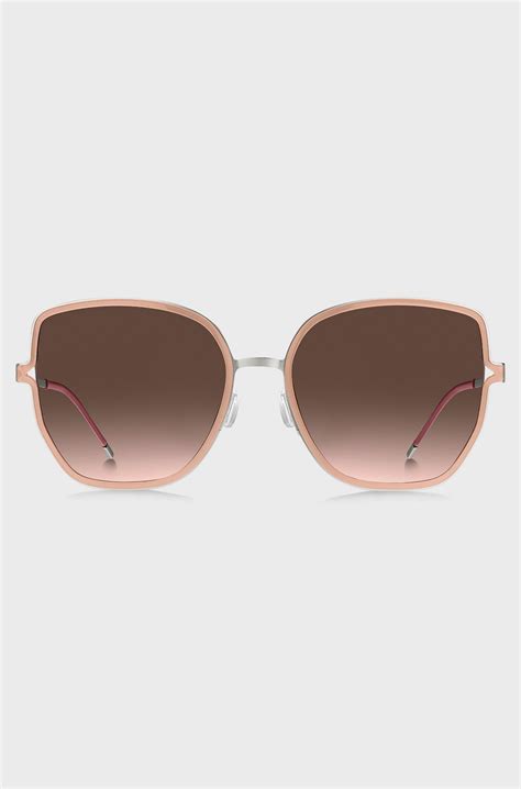 BOSS - Nude-frame sunglasses with forked temples and branded chain