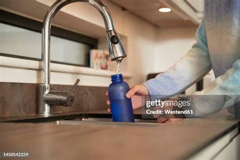 Water Bottle Fill Photos and Premium High Res Pictures - Getty Images