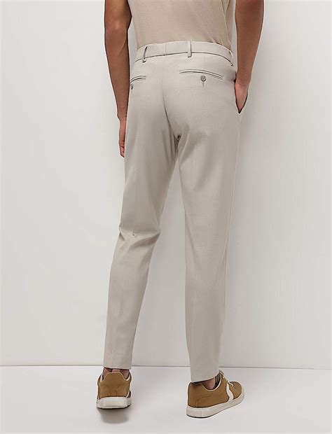 Buy Mid Waist Textured Slim Fit Trousers at Marks & Spencer