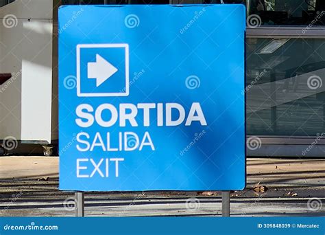 Trilingual Exit Sign in a Public Space Stock Illustration ...