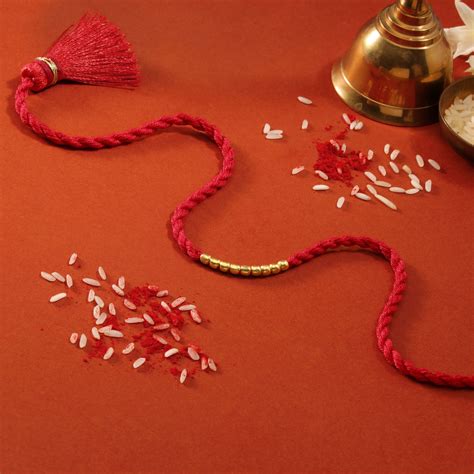 Elegant Golden Beads Sterling Silver Thread Rakhi For Him – Zavya