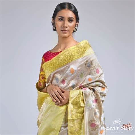 Offwhite meenakari boota saree with yellow kadhiyal border – WeaverStory