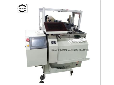 Image result for Tag Stringing Machine