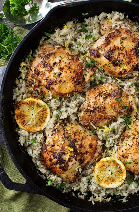 Marinated Greek lemon chicken thighs are seared then baked on top of a ...