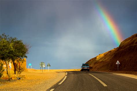 Car Driving into the landscape with a rainbow image - Free stock photo - Public Domain photo ...