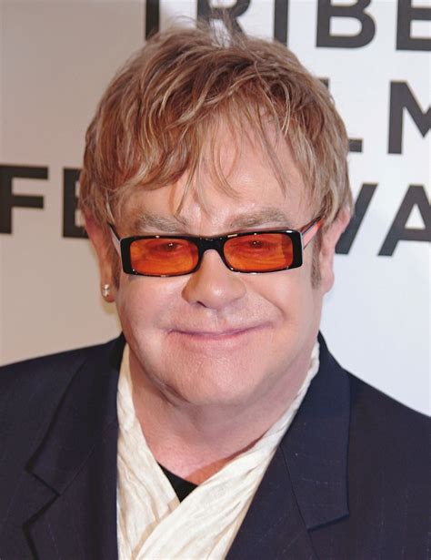 Elton John 2020: Husband, net worth, tattoos, smoking & body facts - Taddlr