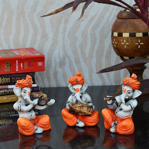 Set of 3 Ganesha Playing Violen, Dholak, and Flute - eCraftIndia Online