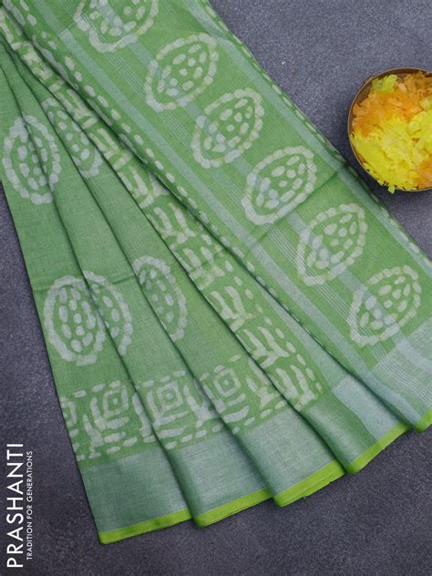 Pure linen saree light green with batik prints and silver zari woven b ...