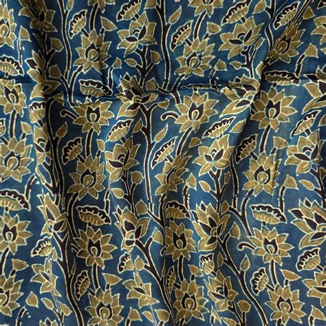Modal Silk Rust Blue With Green Flower Jaal Fabric – Sanskruti