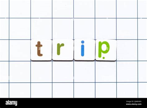Colorful tile letter in word trip on white grid background Stock Photo ...