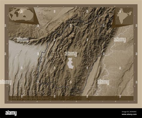 Manipur, state of India. Elevation map colored in sepia tones with lakes and rivers. Corner ...
