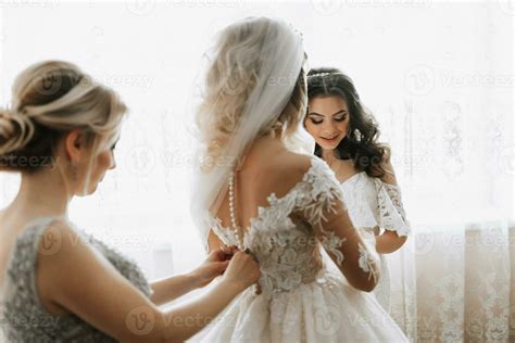 Image result for Bridesmaid Helping Bride