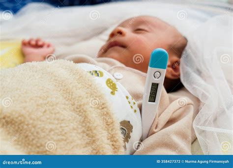 Thermometer Under His Armpit Baby To Measure the Temperature of a Sick ...
