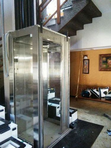 Home Lift - Merrit Hydraulic Home Lift With Glass Door Manufacturer ...