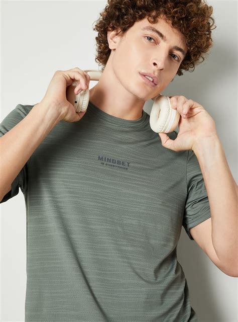 Buy Men Textured Sports T-shirt Online at just Rs. 799.0 ...