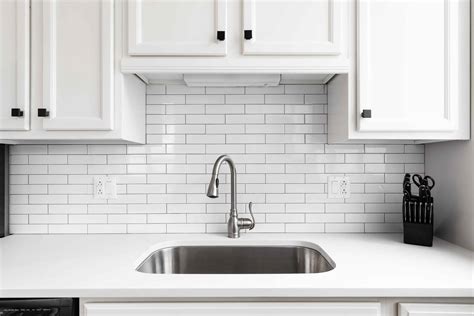 Backsplash Ideas for White Cabinets and Granite Countertops