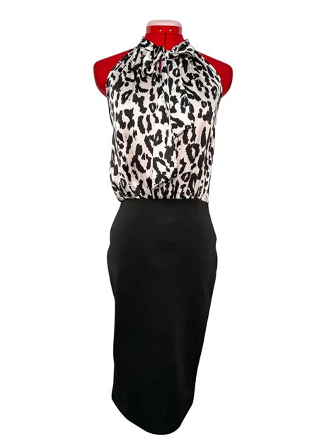 Black & white animal print dress with black fitted skirt - RENTAL ...