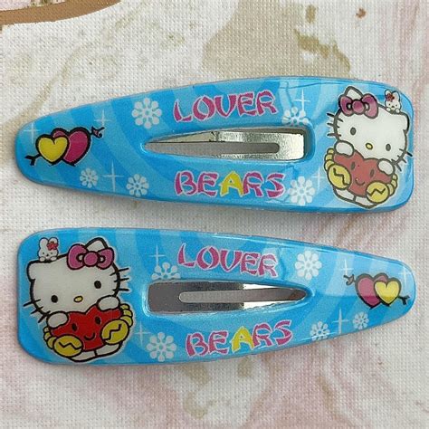 ‘LOVER BEARS’ blue hello kitty hair clips Free... - Depop
