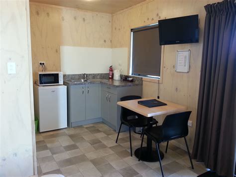 The kitchen in our studio motels. | Ensuite shower room, Kitchenette ...