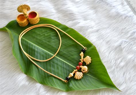 Gold tone black-coral beads bottu mangalyam dj-38973 – dreamjwell