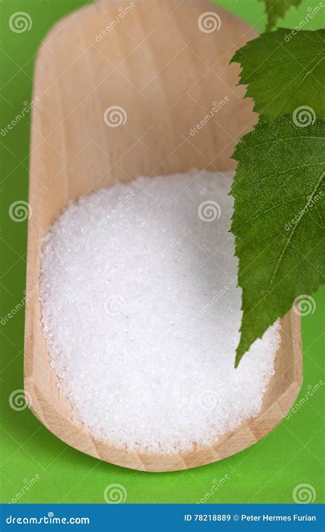 Xylitol Birch Sugar on Wooden Scoop Over Green Stock Image - Image of table, close: 78218889